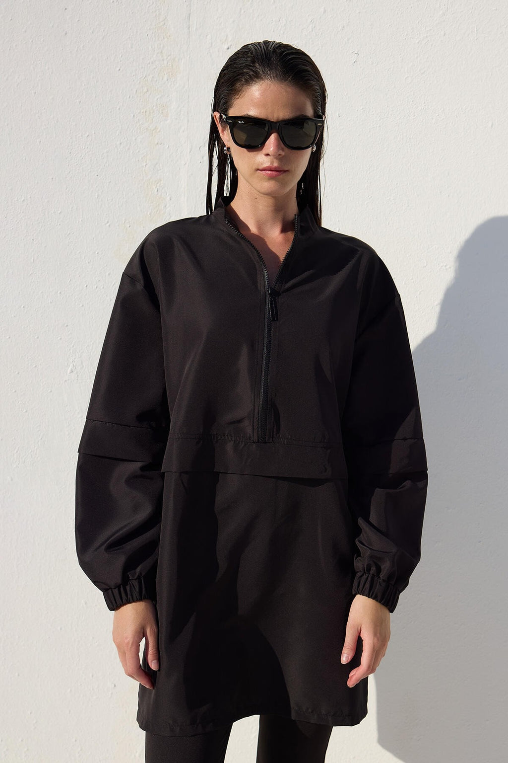 Black one-piece athletic parachute swimsuit