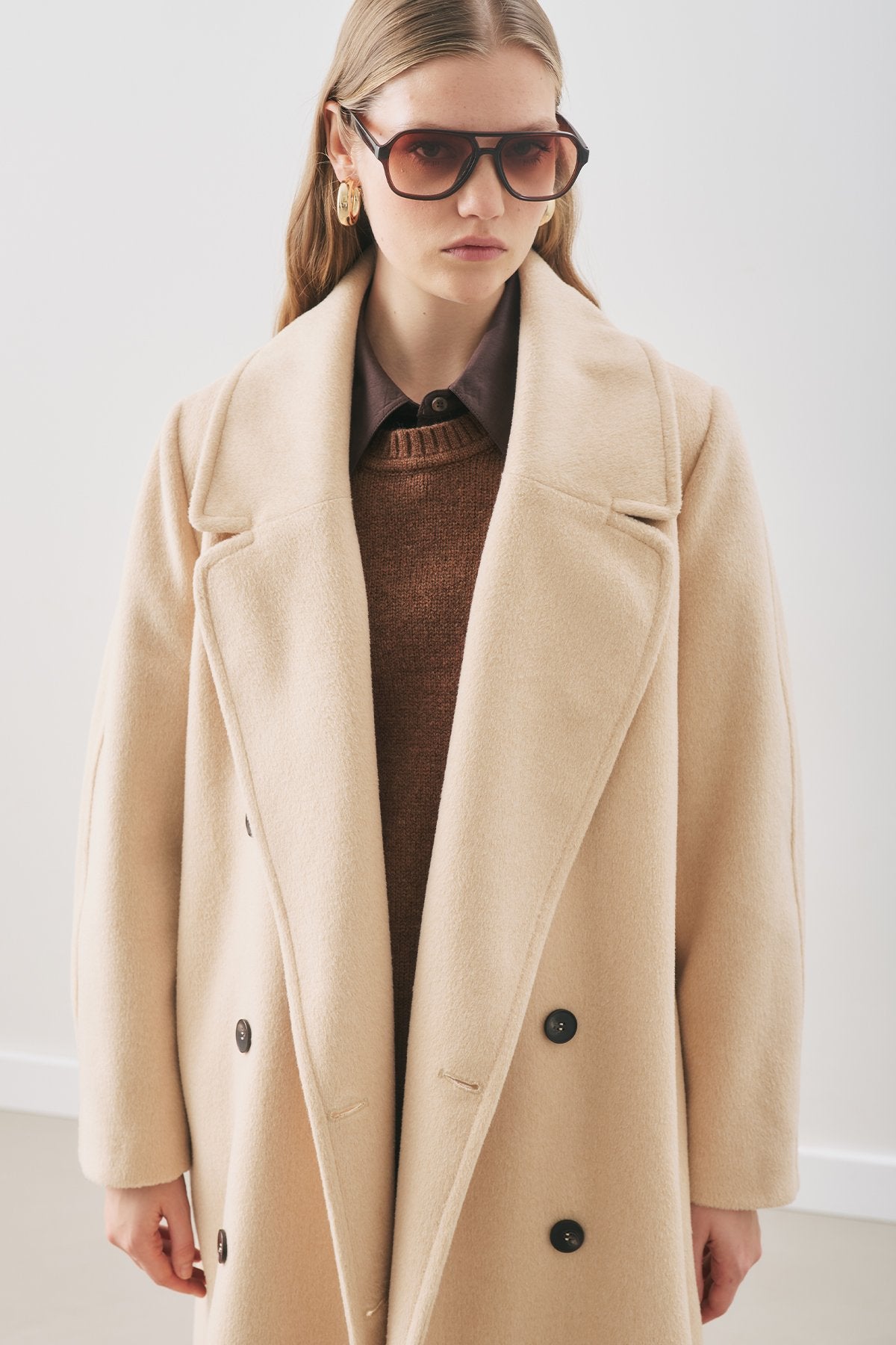 Beige double-breasted wool coat