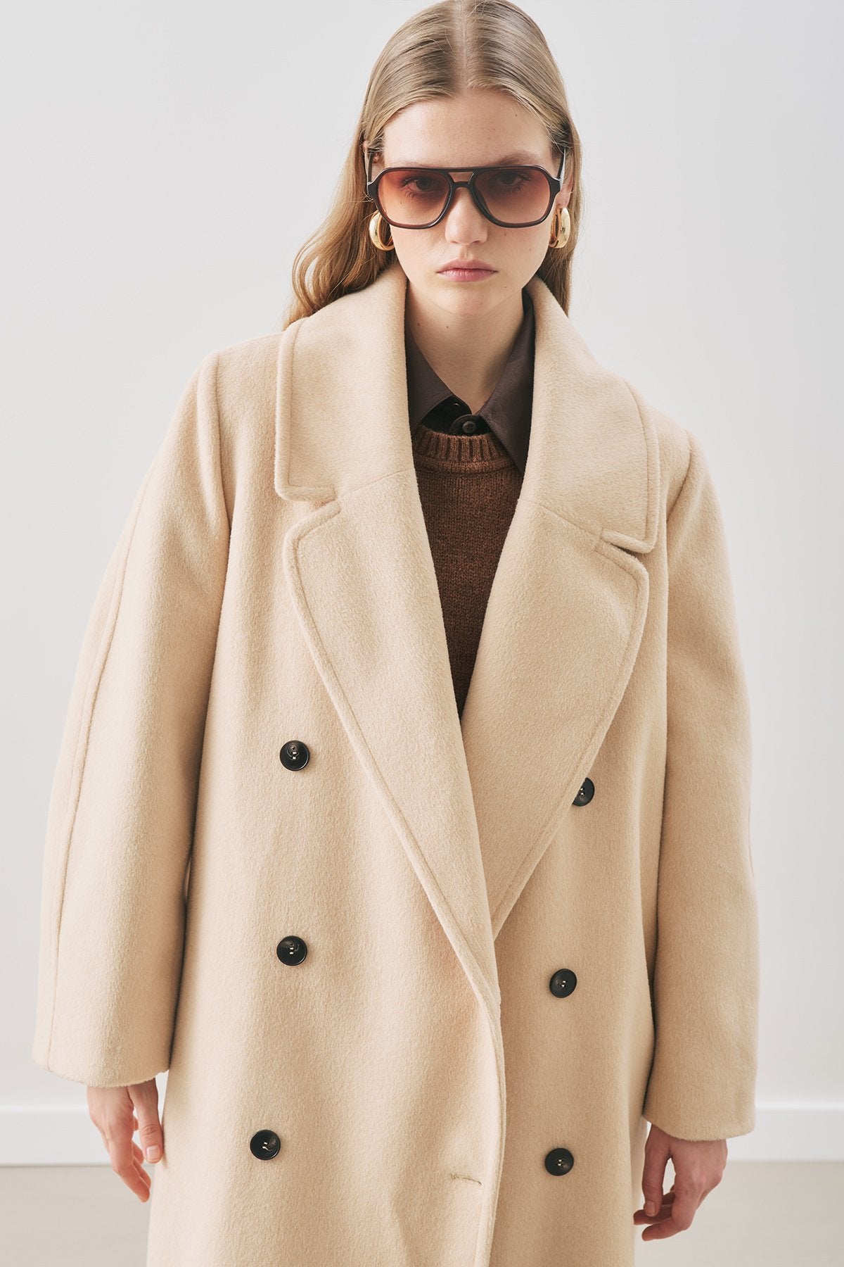 Beige double-breasted wool coat