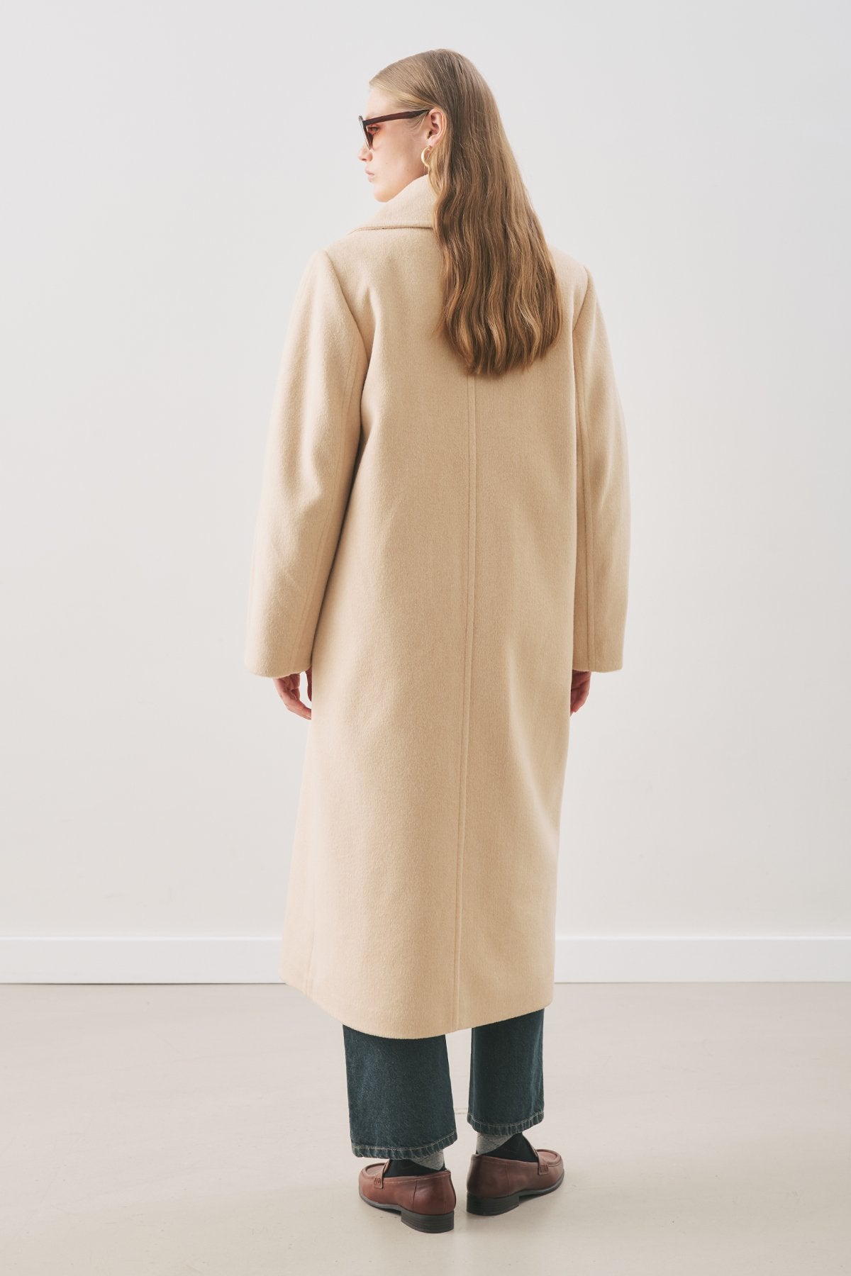 Beige double-breasted wool coat