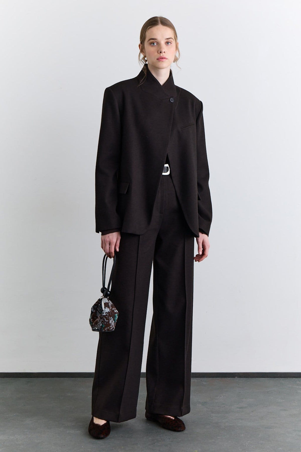 Brown classic pleated fabric trousers