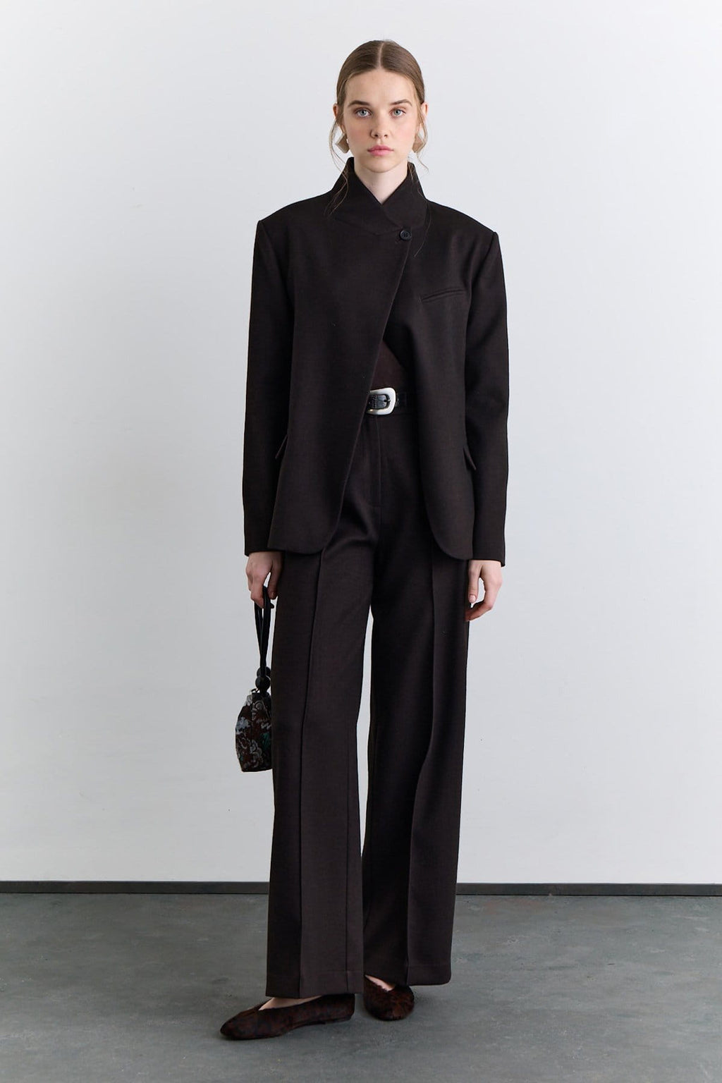 Brown classic pleated fabric trousers