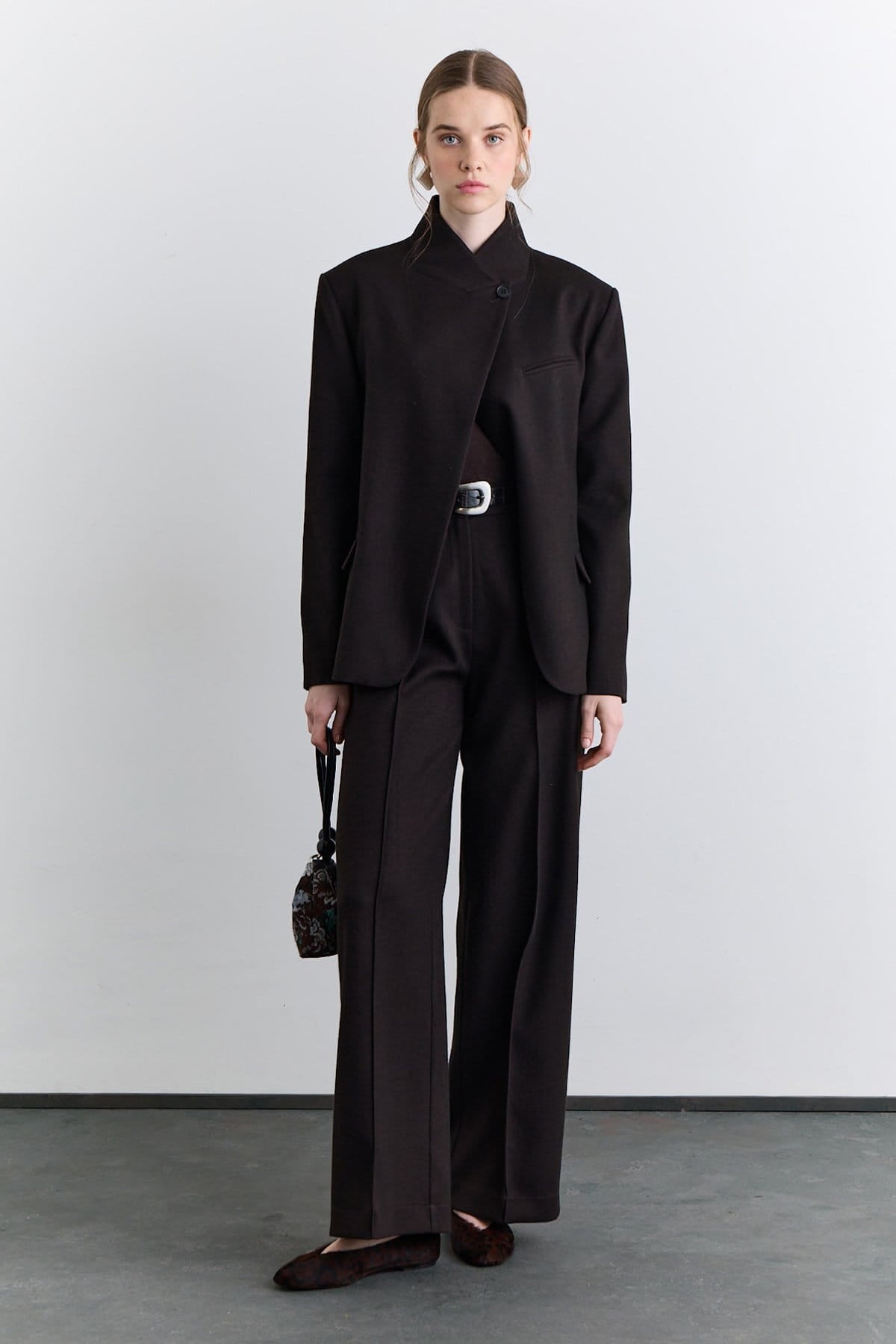 Brown classic pleated fabric trousers