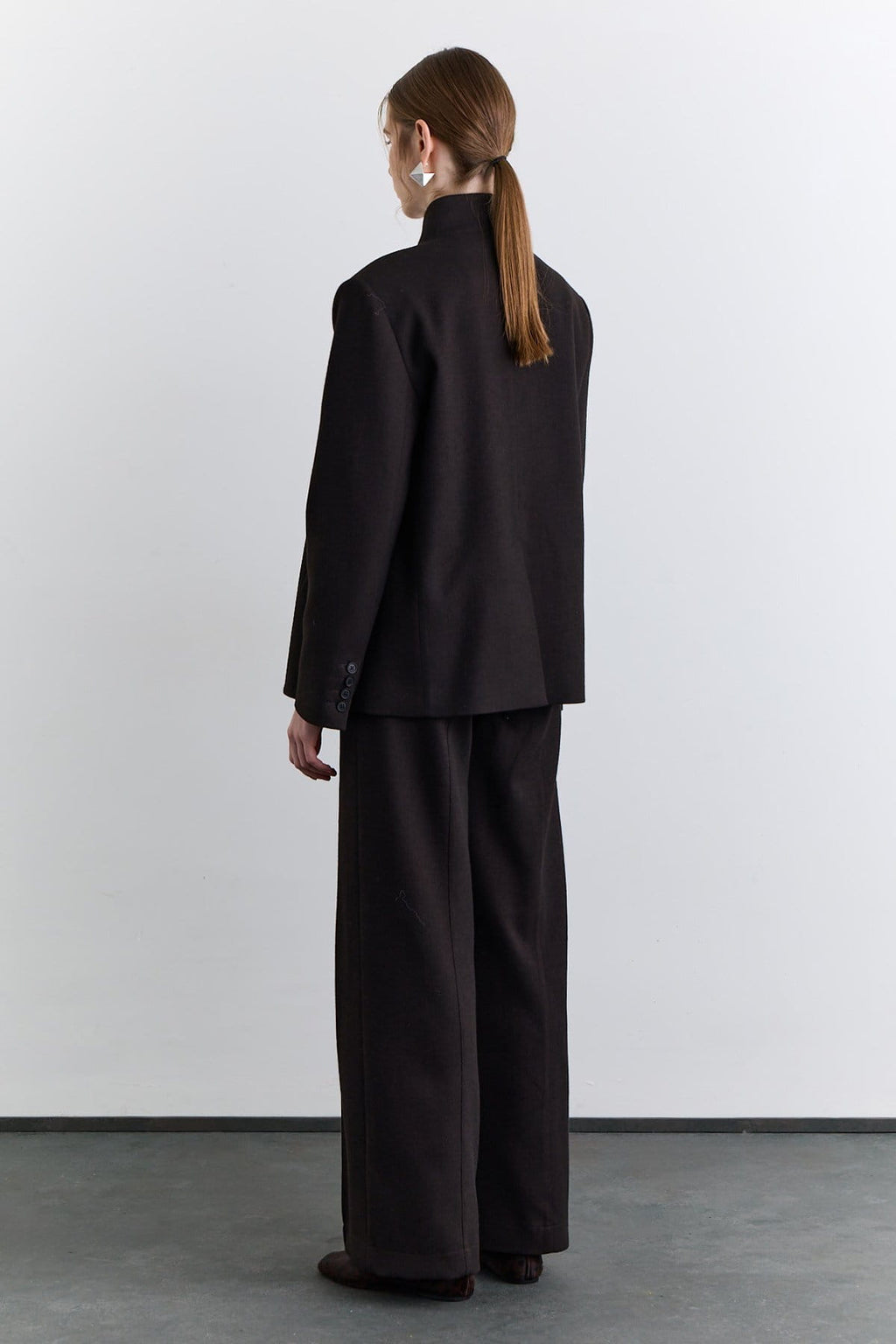 Brown classic pleated fabric trousers