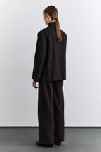 Brown classic pleated fabric trousers