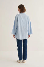 Blue organic cotton v-neck blouse