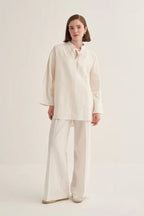 Ecru organic cotton v-neck blouse