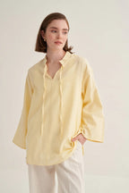 Butter yellow organic cotton v-neck blouse
