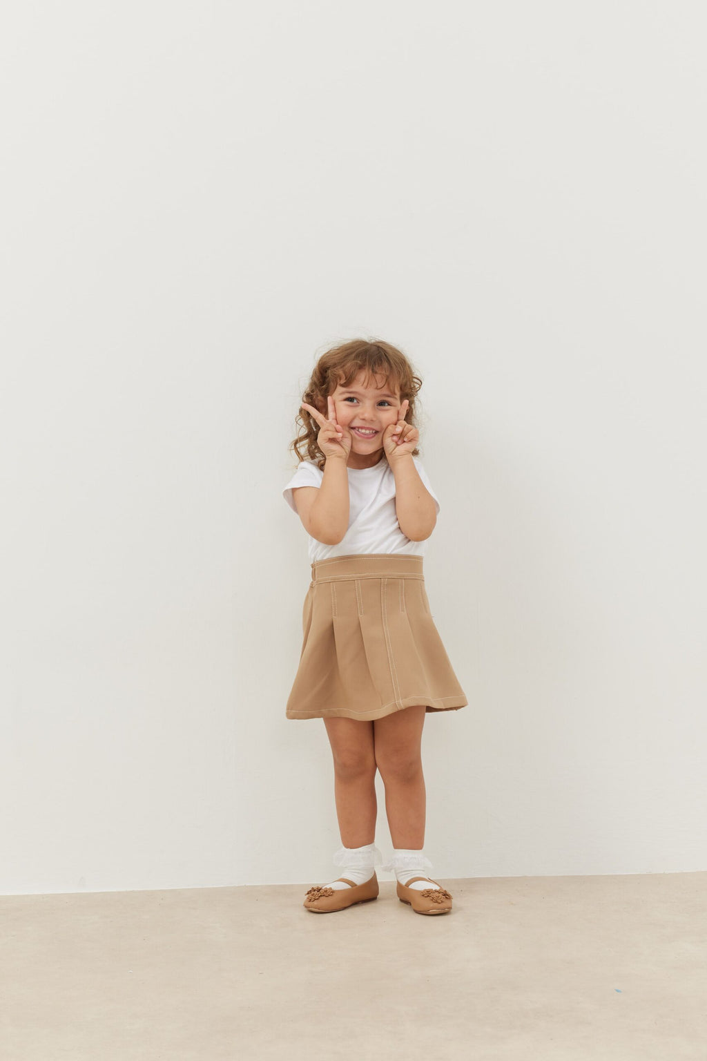 Pleated skirt beige