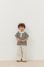 Bold striped black polo neck oversize t-shirt