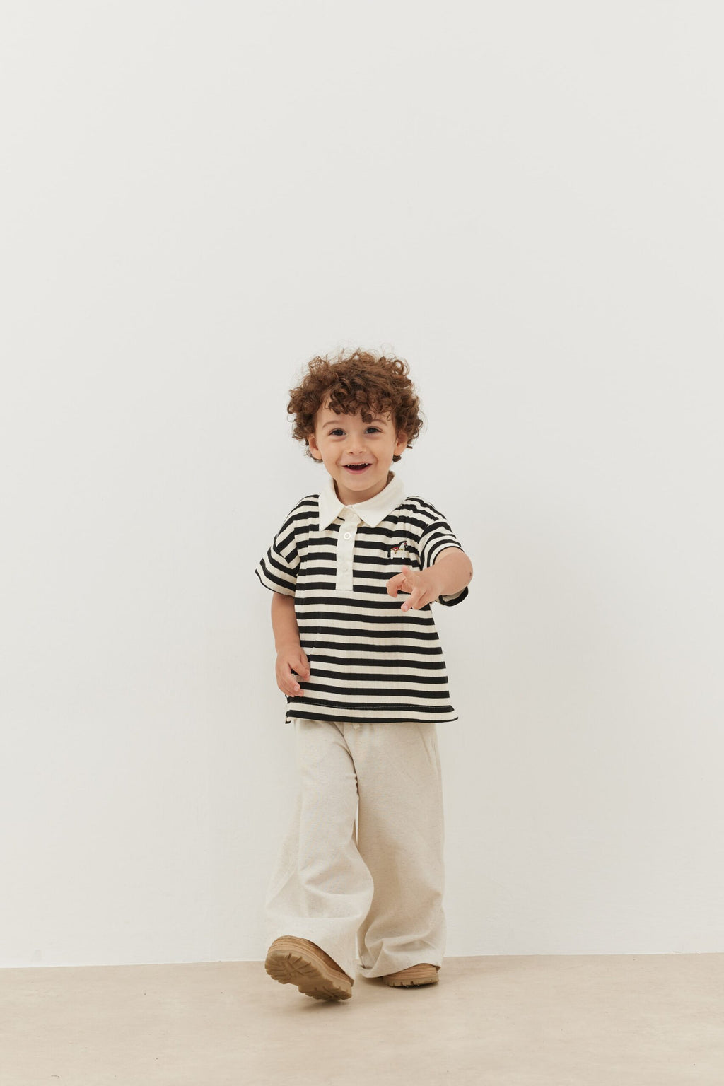 Bold striped black polo neck oversize t-shirt