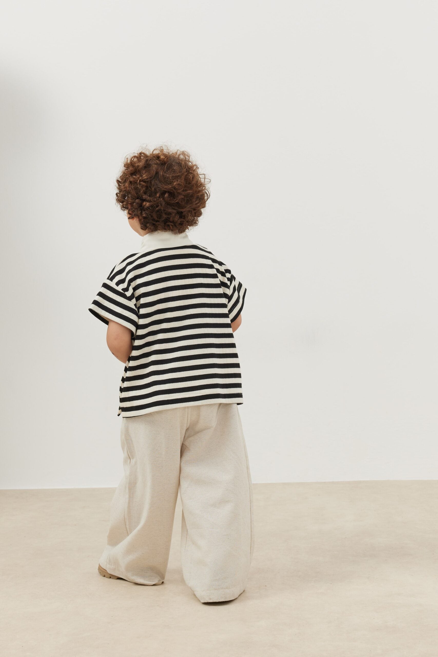 Bold striped black polo neck oversize t-shirt