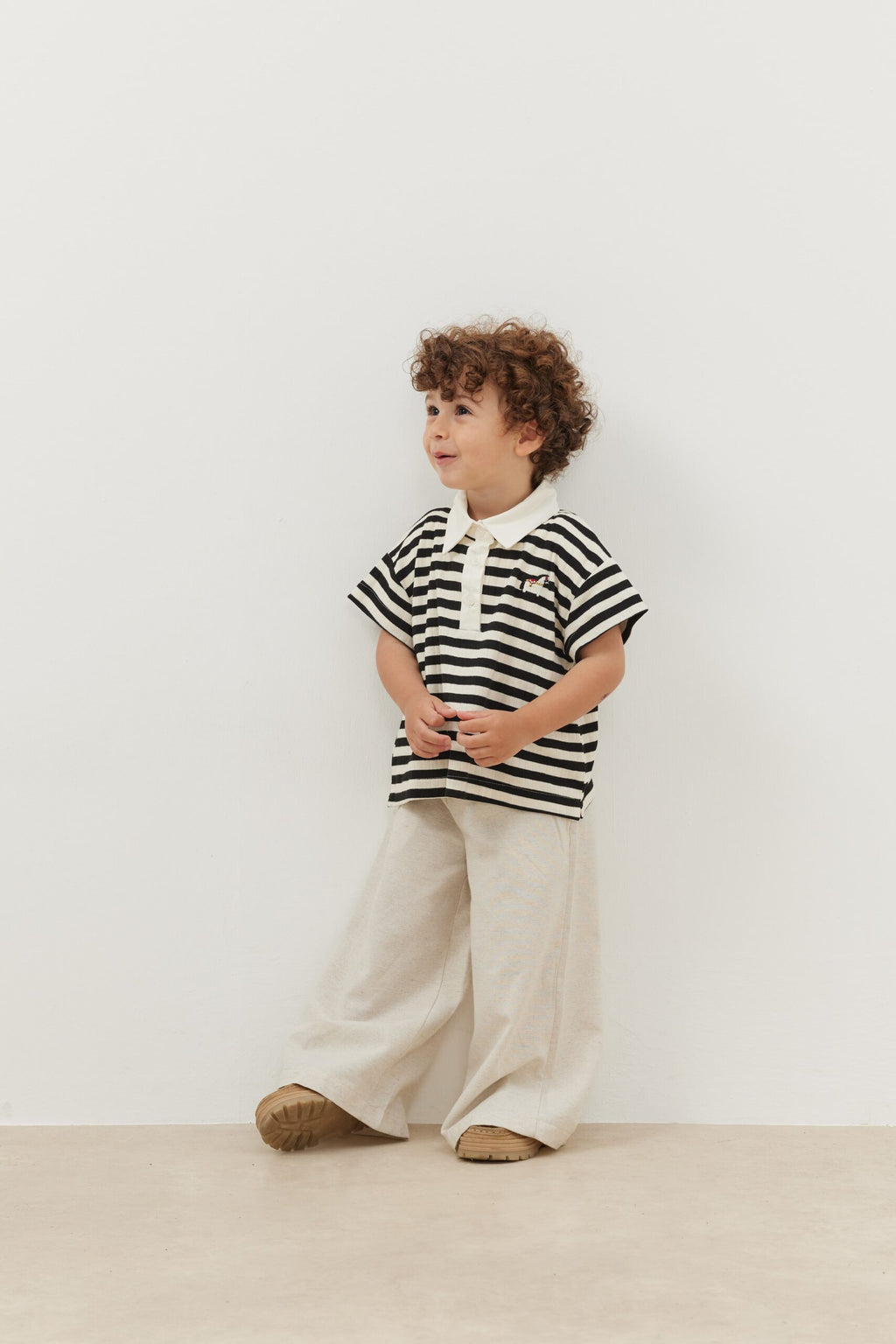Bold striped black polo neck oversize t-shirt