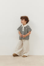 Bold striped black polo neck oversize t-shirt