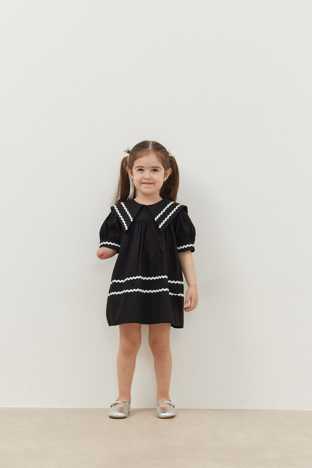Asymmetrical striped dress black