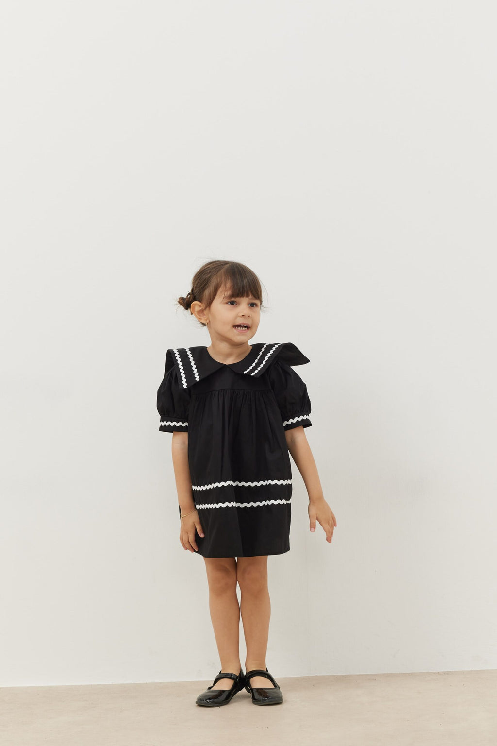 Asymmetrical striped dress black