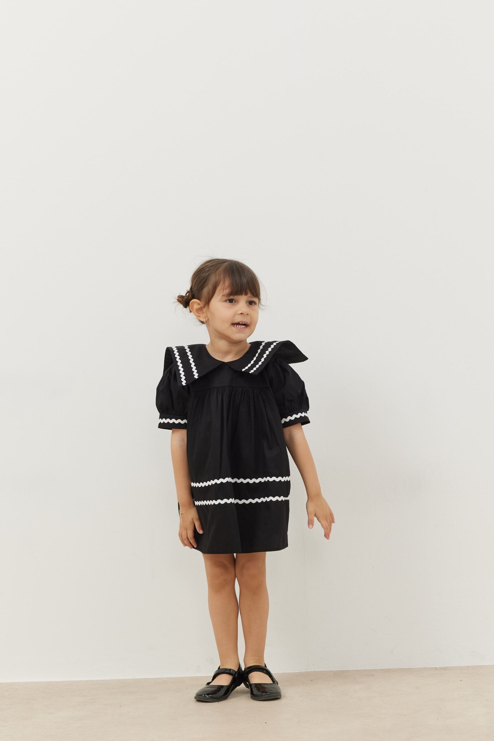 Asymmetrical striped dress black