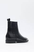 Black elastic ankle boots
