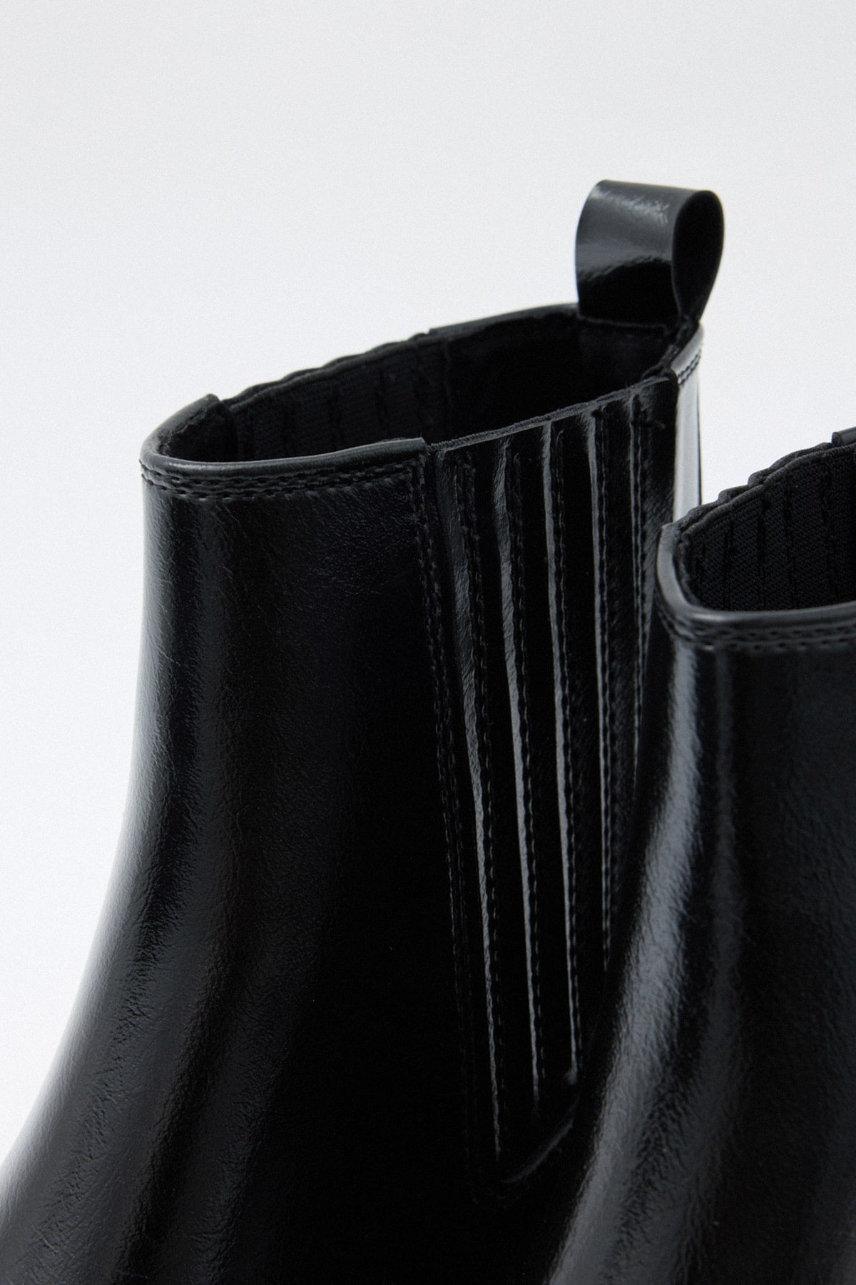 Black elastic ankle boots