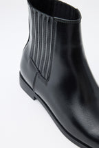 Black elastic ankle boots