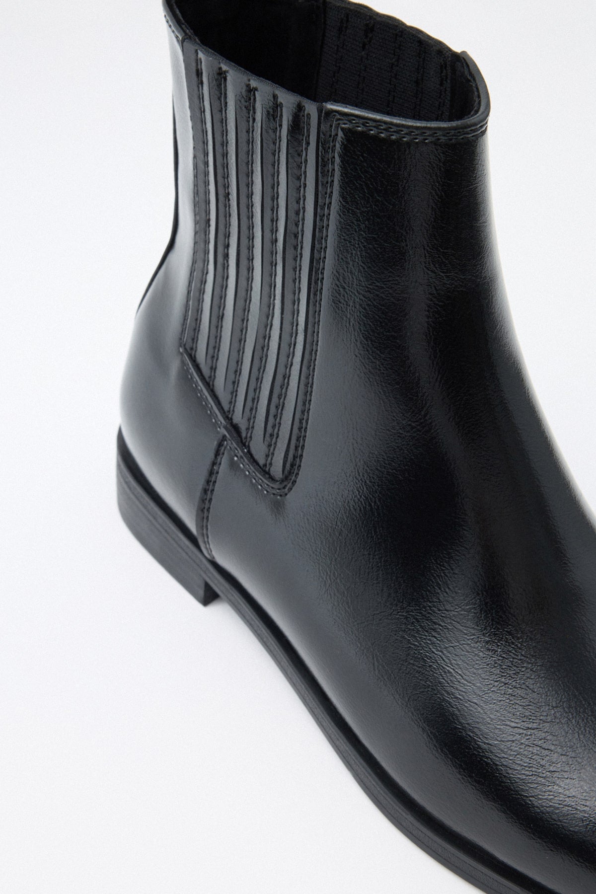 Black elastic ankle boots
