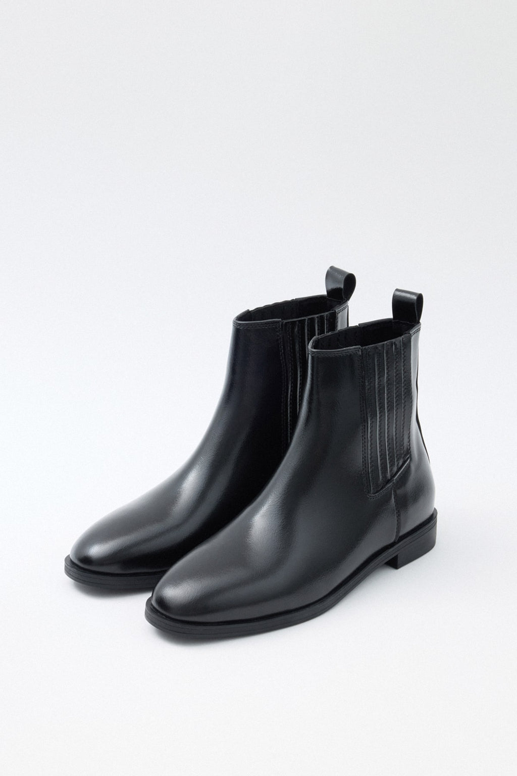 Black elastic ankle boots