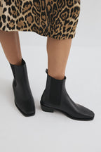 Black square-toe elastic boots