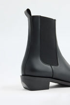 Black square-toe elastic boots