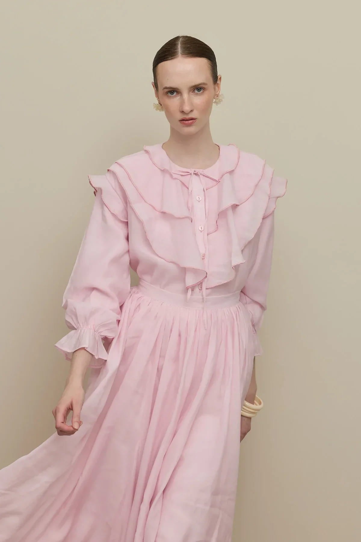 Light pink flounced detail suit
