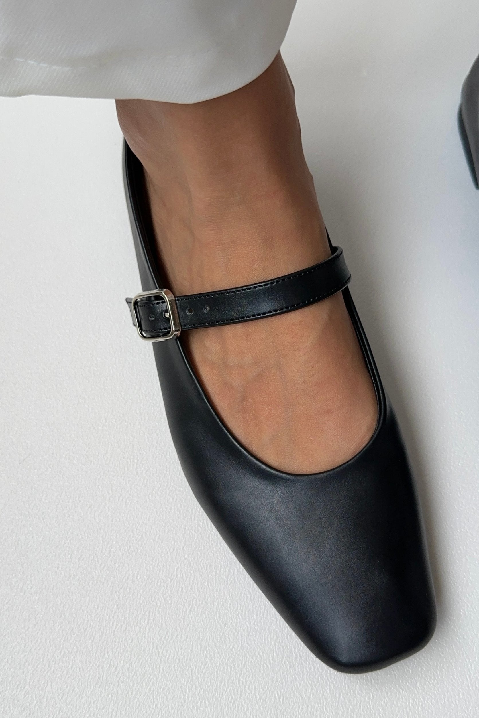 Black soft leather ballet flats