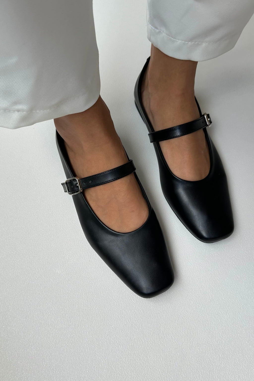 Black soft leather ballet flats