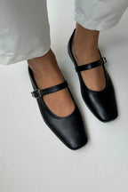 Black soft leather ballet flats