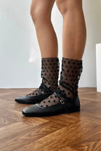 Black soft leather ballet flats