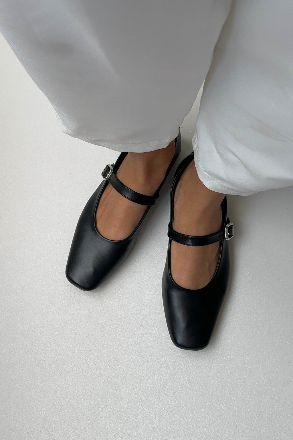 Black soft leather ballet flats