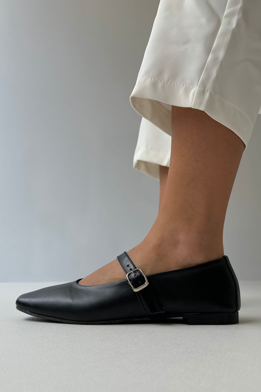 Black soft leather ballet flats