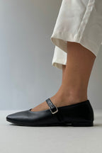 Black soft leather ballet flats
