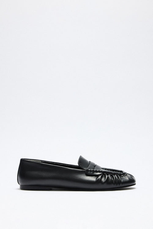 Black ruched loafers