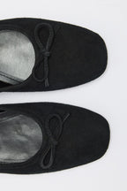 Black suede bow flats