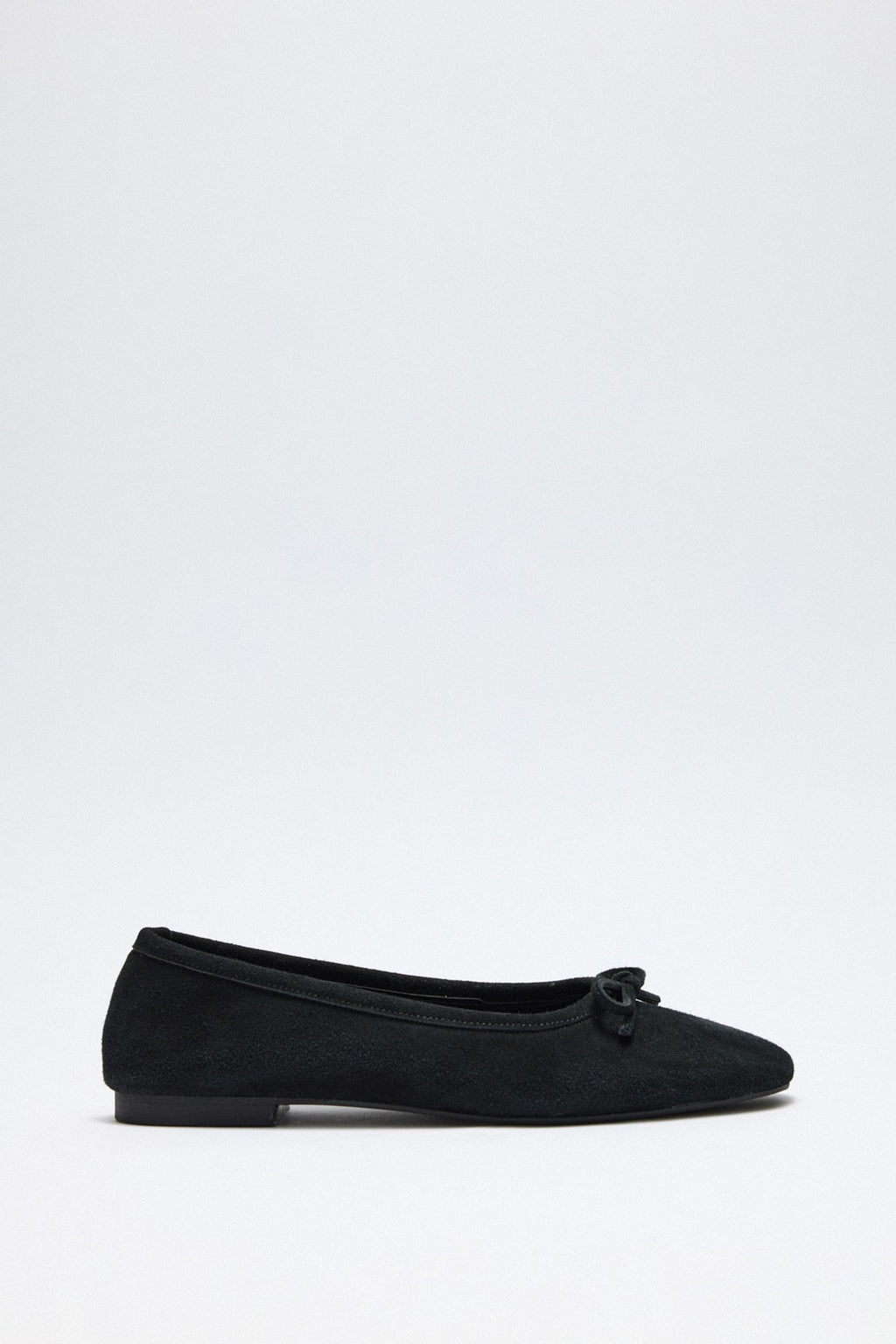 Black suede bow flats