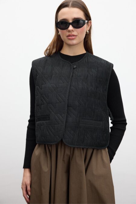Black quilted embroidered vest