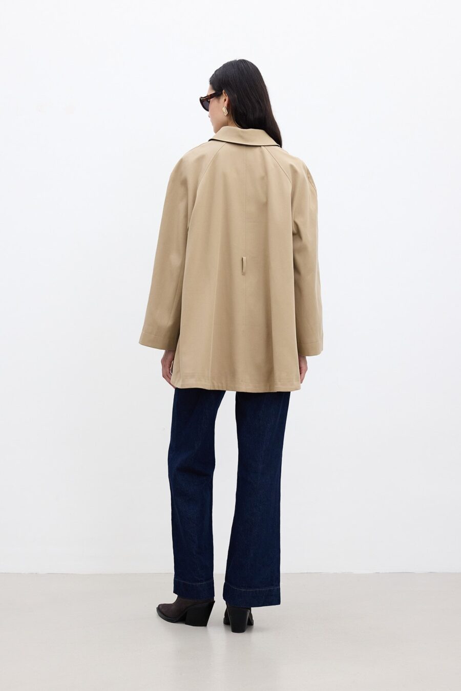 Camel trench coat with cape detail