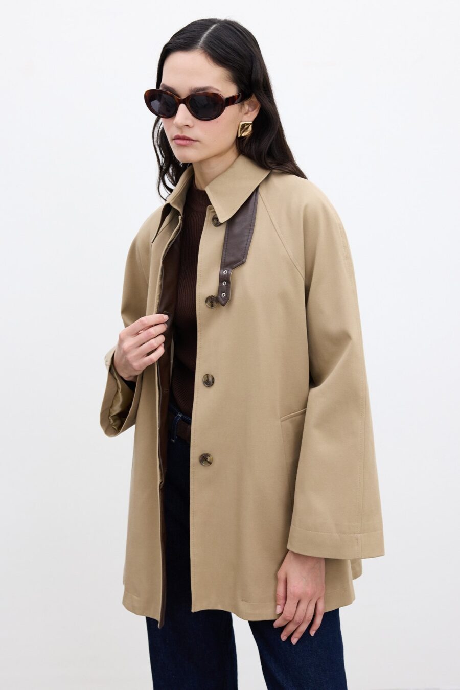 Camel trench coat with cape detail