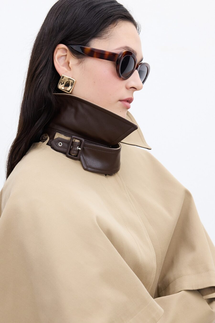 Camel trench coat with cape detail