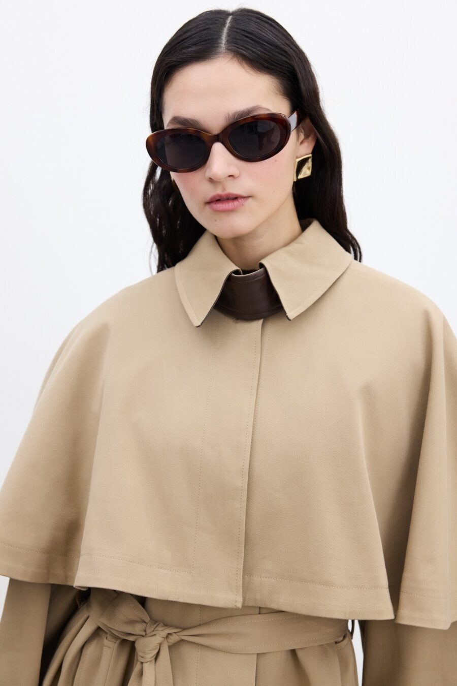 Camel trench coat with cape detail