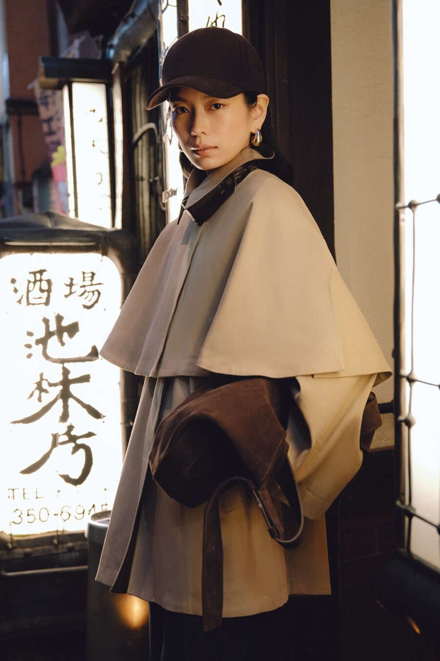 Camel trench coat with cape detail