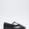 Black cutout leather ballerina flats