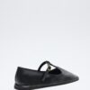 Black cutout leather ballerina flats