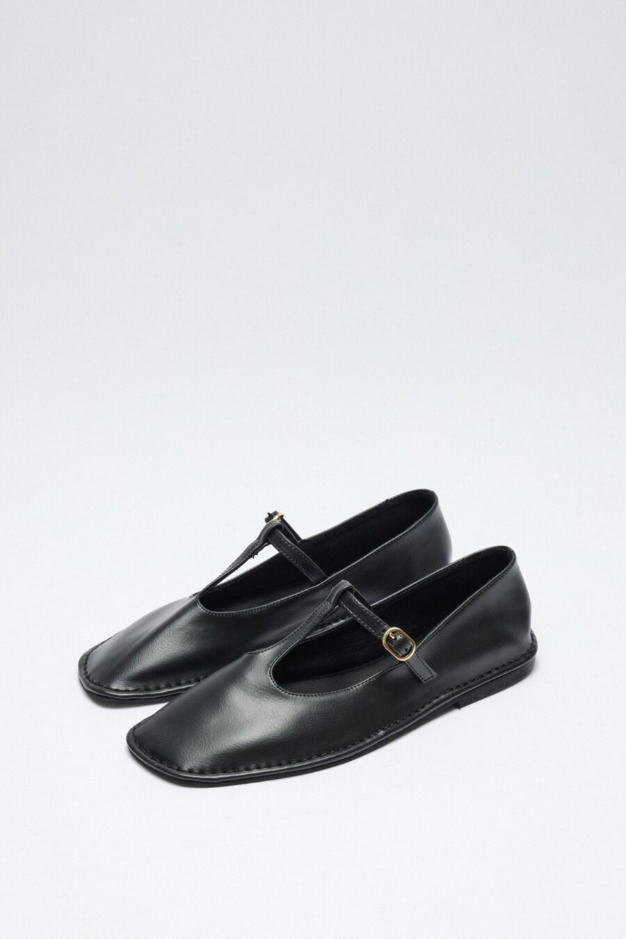 Black cutout leather ballerina flats