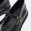 Black cutout leather ballerina flats