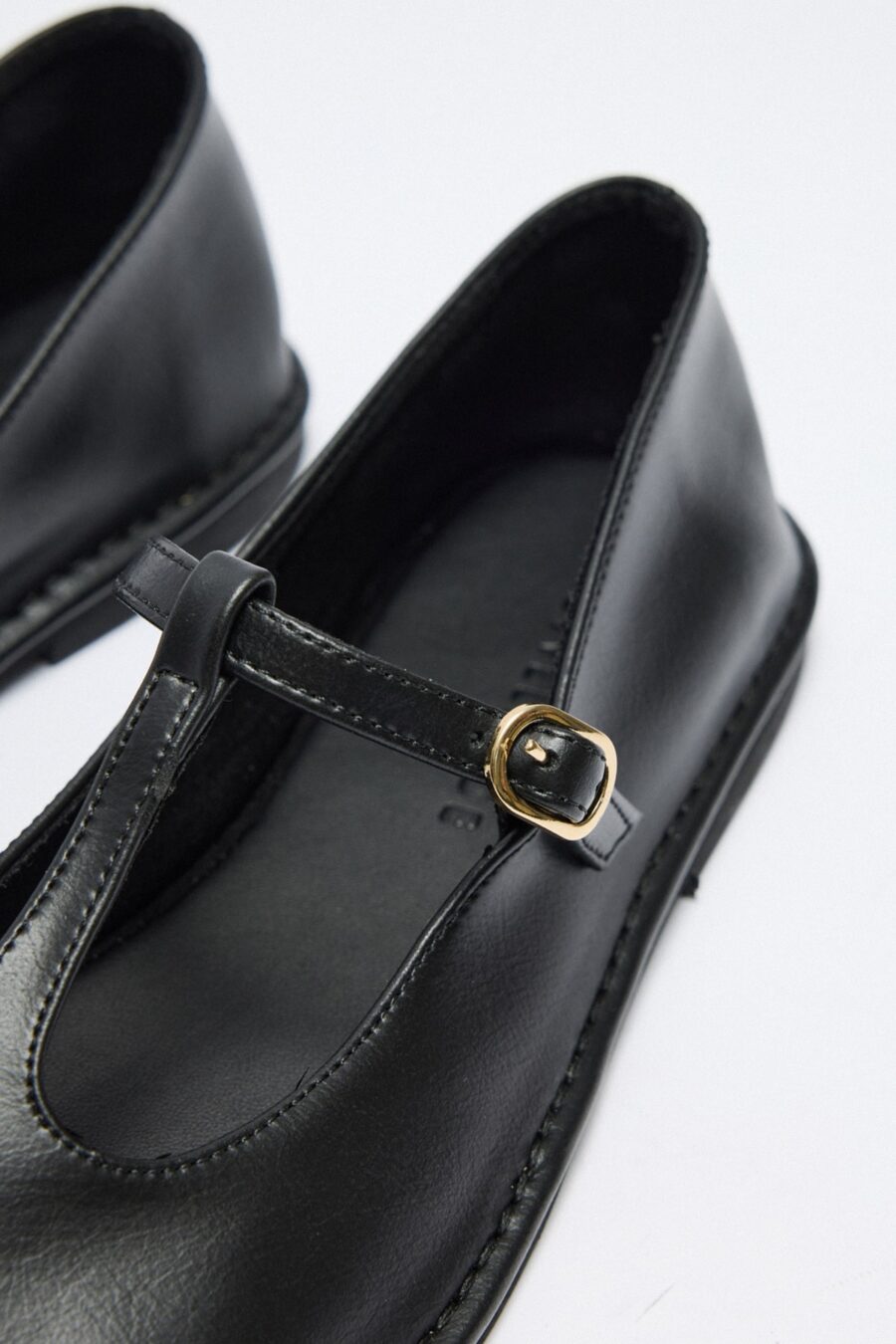 Black cutout leather ballerina flats